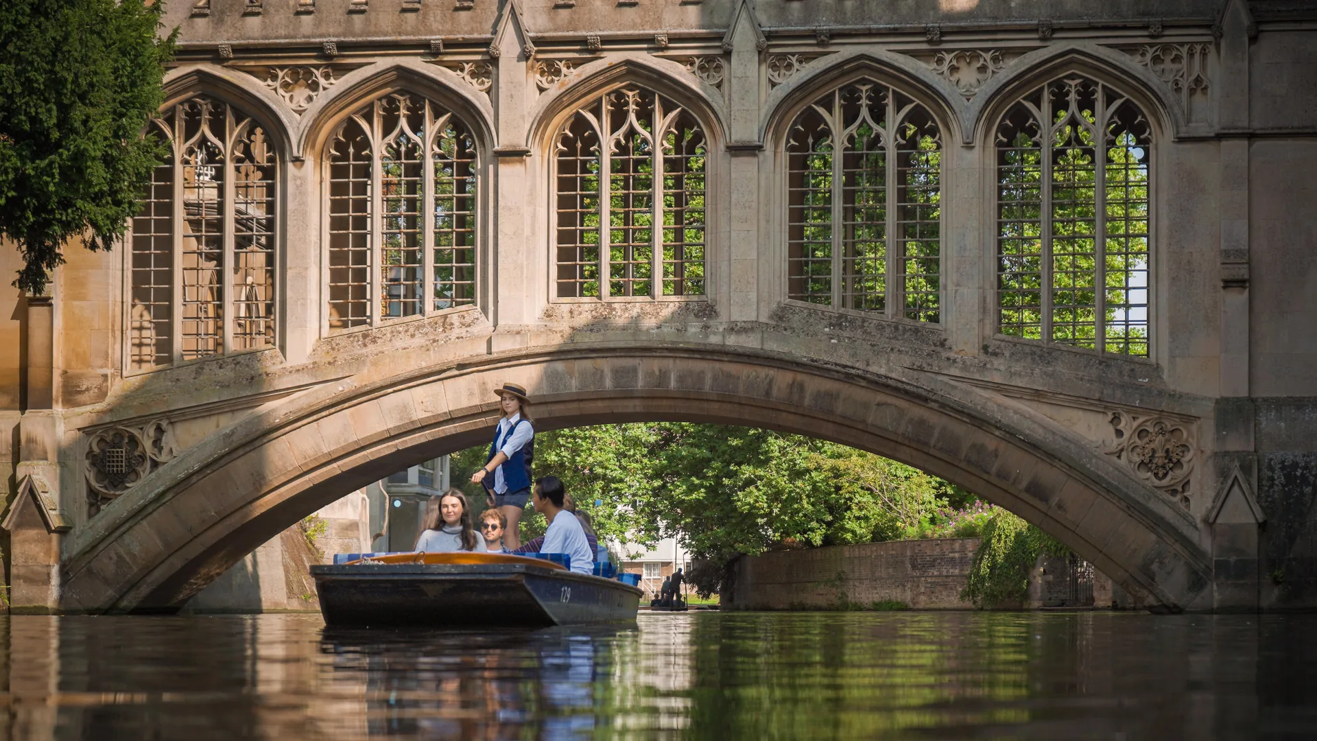 A punt under the covered Bridge of Sighs on the River Cam, from Scudamore's tour listing